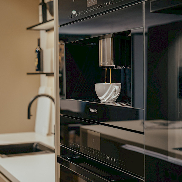 Miele Einbaukaffemaschine - schwarze fronten